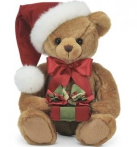 a christmas teddy bear with gift